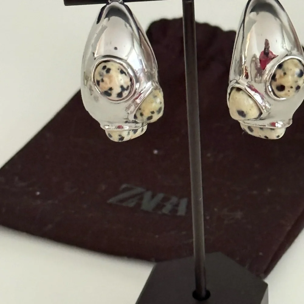 Zara EUC crescent shaped silver toned earrings with stones
